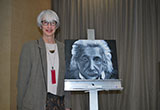 Faculty member Dr. Ellen Grober with her portrait of Albert Einstein