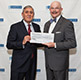 Dean Spiegel with Dr. Todd Olson, professor of anatomy and structural biology. The check represents a remarkable $8 million bequest to Einstein from the late Dr. George Fruhman, associate professor of anatomy and structural biology, establishing endowed four-year scholarships for medical students of intellectual merit