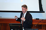 Dr. Sharpless begins his presentation, “The Dynamic Interplay between Cancer and Aging.”