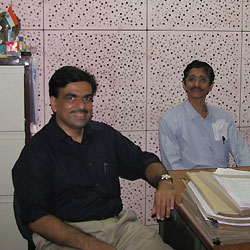 Dr. Verghese with his co-PI, Dr. Mathuranath, in Kerala, India