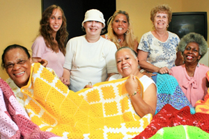 The crochet group (from left): Otelia Montedesire, Shirley Saban, Barbara Gelnick, Genoveva Mercado (sitting), Michele Spiritu, Evelyn Hone and Dolores Nelson