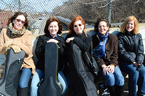 The BluesMothers (from left):  Irene Maher (guitar and vocals), Jenny (lead vocals and guitar), Joan Lippert (bass and vocals), Hope Berkeley (harmonica and vocals) and Pam Sklar (flute and vocals). Photo credit: Susan Rutman.