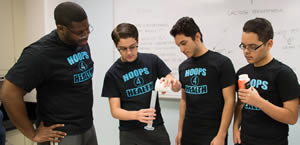 EEP students work on an experiment supervised by Hoops 4 Health co-founder Kim Ohaegbulam