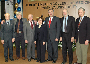 Dr. Dominick P. Purpura, former Einstein dean (third from left), and Richard M. Joel, president of Yeshiva University (third from right), with the College of Medicine’s newly minted (in 2005) distinguished professors (from left): Drs. Stanley Nathenson, Michael V.L. Bennett, Susan Band Horwitz, Matthew Scharff and Albert Kuperman