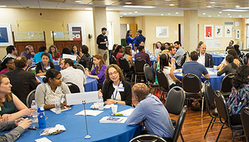 Ph.D. alumni  and faculty members meet and chat with Einstein postdocs, graduate students and MSTP students, during a speed networking session held in the morning 