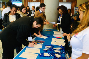 Signing up for the HOPE Symposium at the Price Center.