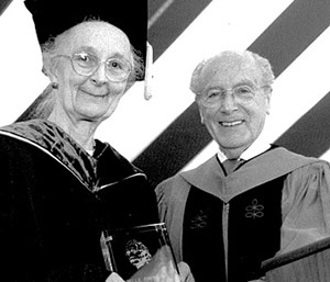 Dr. Rapin receiving her Honorary Alumna award at commencement, in 2000, from Dr. Dominick P. Purpura