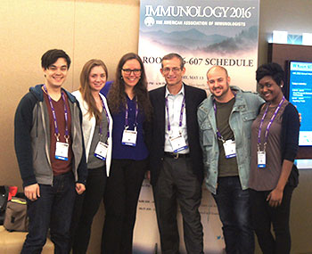 Graduate students in the lab of Dr. Chaim Putterman pose with their mentor at a recent conference. (From left): Evan Der (PhD student), Sammy Chalmers (PhD student), Jess Doerner, Dr. Putterman, Ariel Stock (MSTP student) and Elise Mike (MSTP student).