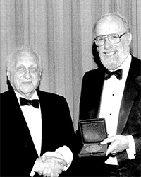 Dr. Scharff with Dr. Harry Eagle, after receiving his New York Academy of Medicine Award