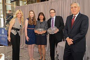 Drs. Hsu and Pass receive their awards, flanked by Jill Martin, Briana Barker and Dean Spiegel