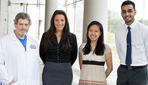Dr. Ralph Liebling with Einstein medical students Stacey Frisch, Helena Wu and Parth Patel
