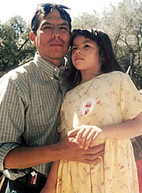 A young Hannah with her father