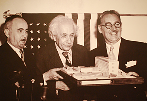 The College of Medicine's namesake, Albert Einstein, with a model of the institution that proudly bears his name.