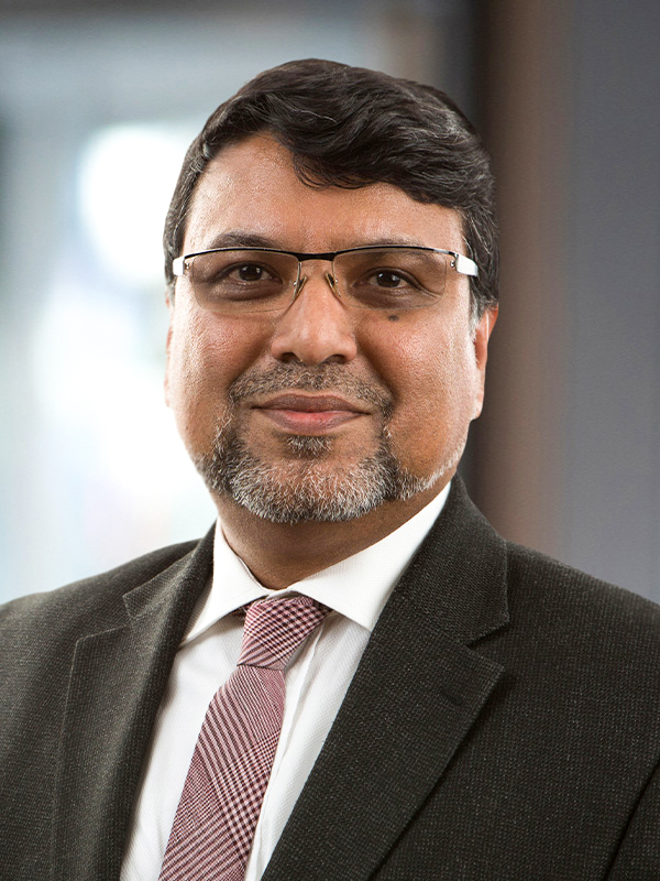Chandan Guha, MBBS, PhD