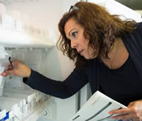 Anita Butta checks inventory in the freezers