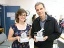 Arturo and Emma with trophies - The former published 500 papers and the latter made the perfect guess in the 500th-publication contest